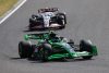 Zhou Guanyu, Kick Sauber F1 Team C44, leads Nico Hulkenberg, Haas VF-24; 2024 Japanese Grand Prix, Formula One World Championship